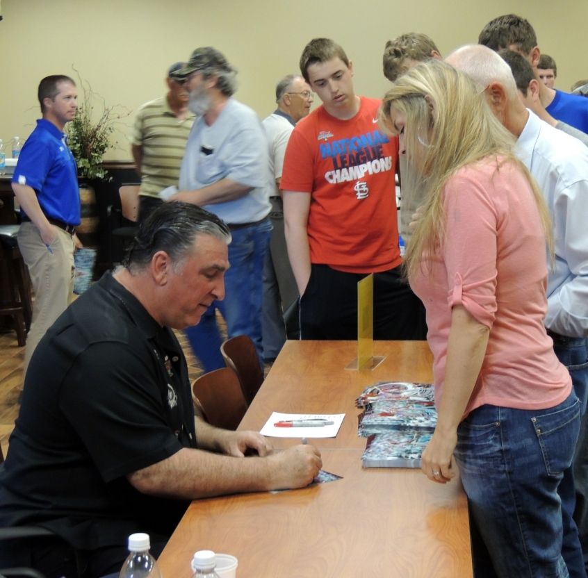 Jack Clark signs autographs at 2014 Baseball Luncheon